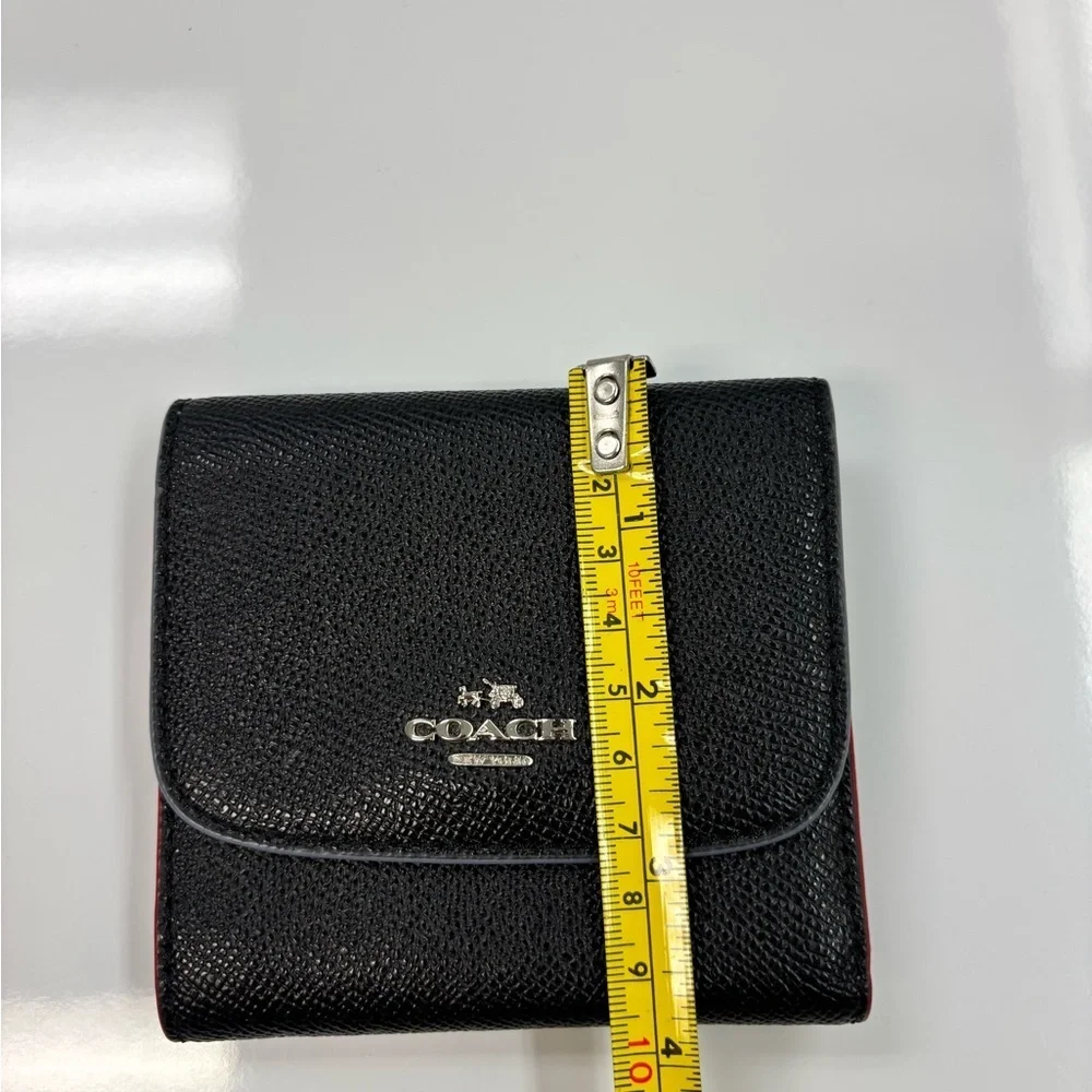 Coach Black Textured Leather Wallet. New with Tags. Floral inside design